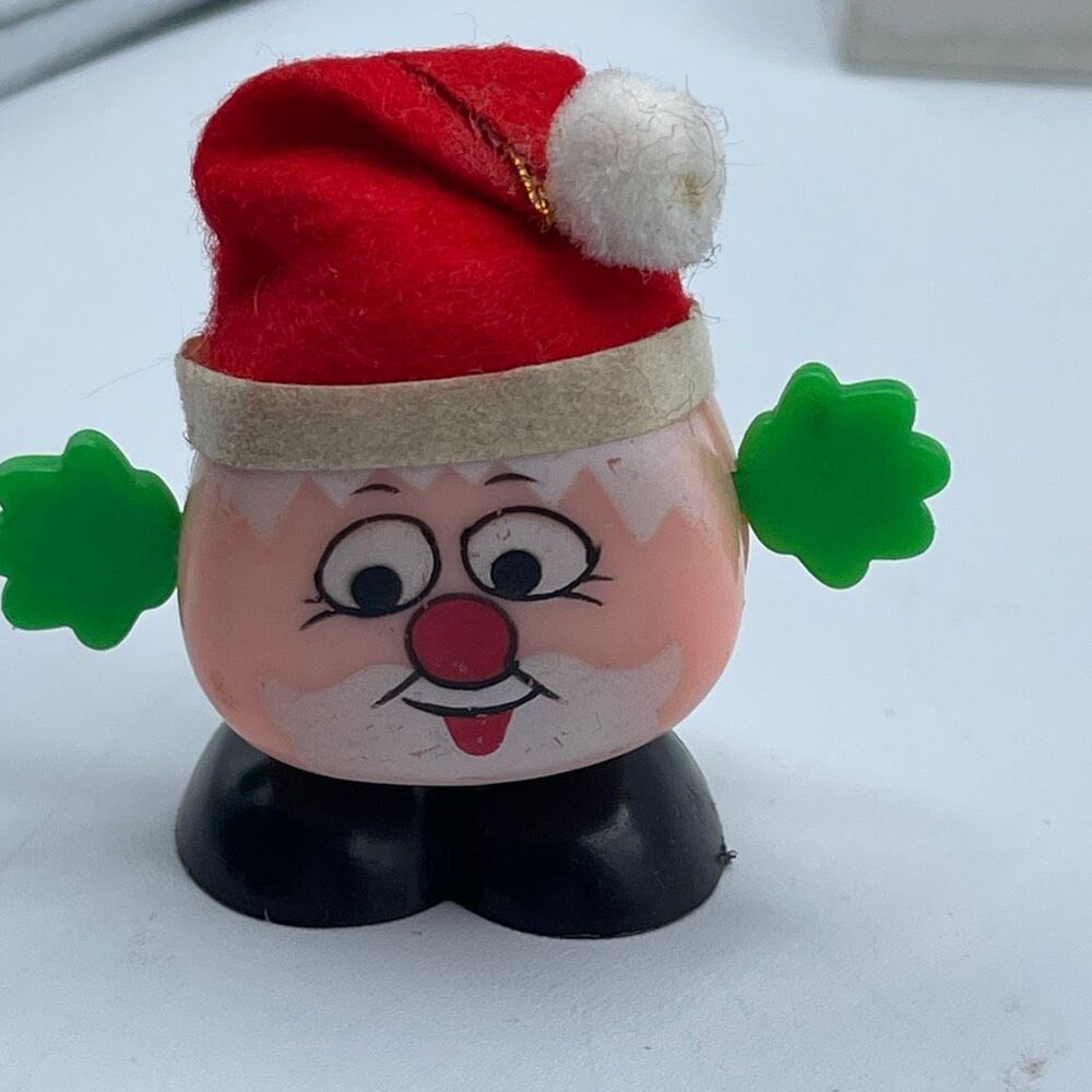 Vintage windup Santa toy. Works great. He dances side to side.